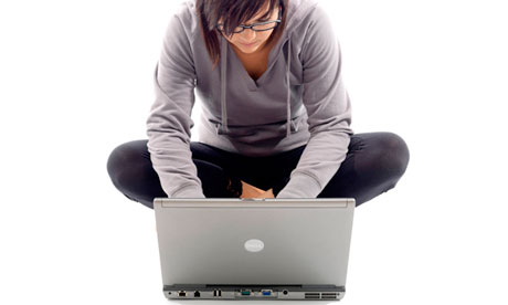 Young Woman Using Laptop Model Released
